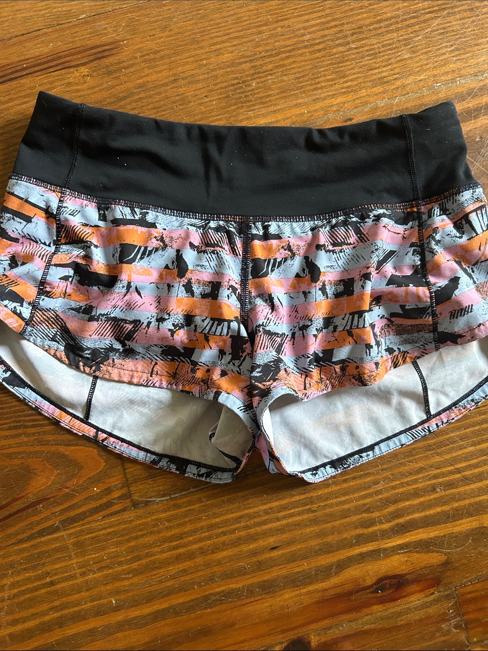 Lululemon speed up short with Pink gray blue and Orange design size 2
